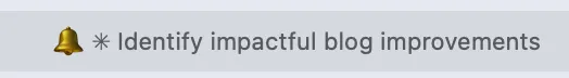 Ghostty tab badged with a bell emoji and an asterisk, signaling the agent in that tab needs attention